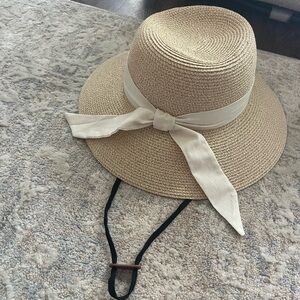 Stylish Tan Straw Hat with White Ribbon